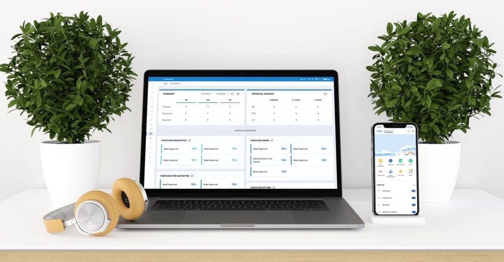 Efficient HRIS and ERP system software displayed on a laptop and smartphone showcasing advanced digital tools for human resource management and enterprise resource planning in Indonesia